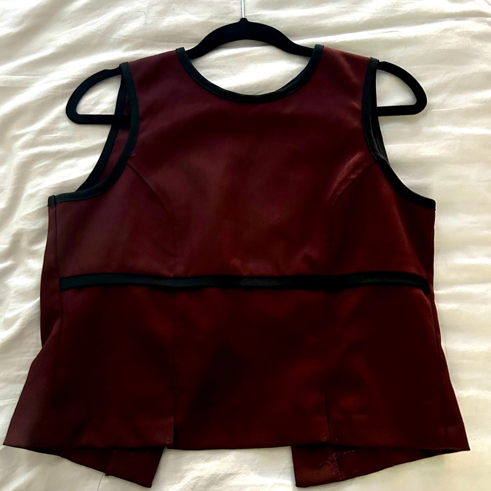 Button-down tank top with a stylish perfect for casual or business casual looks!